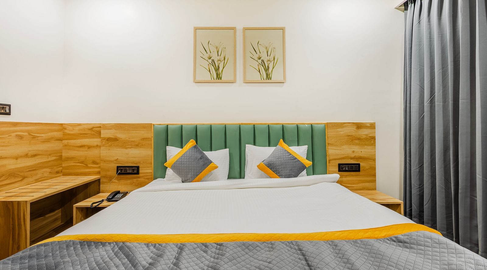 Lemonridge Hotels, KPHB | Another view of the bed with a decorative runner and pillows. Clean and comfortable.